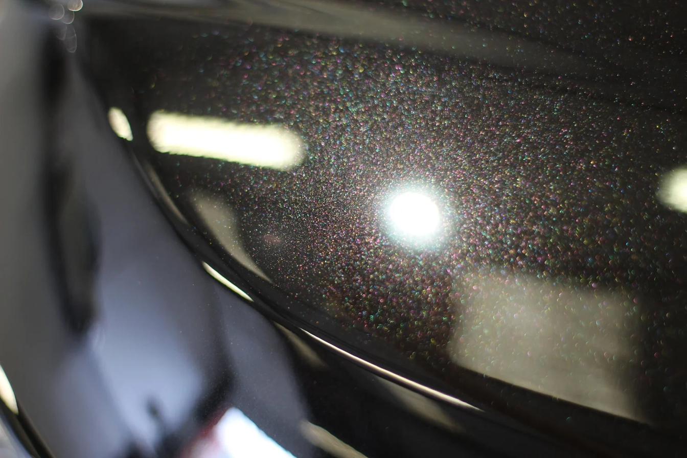 Paint contamination inspection under specialist light Swansea