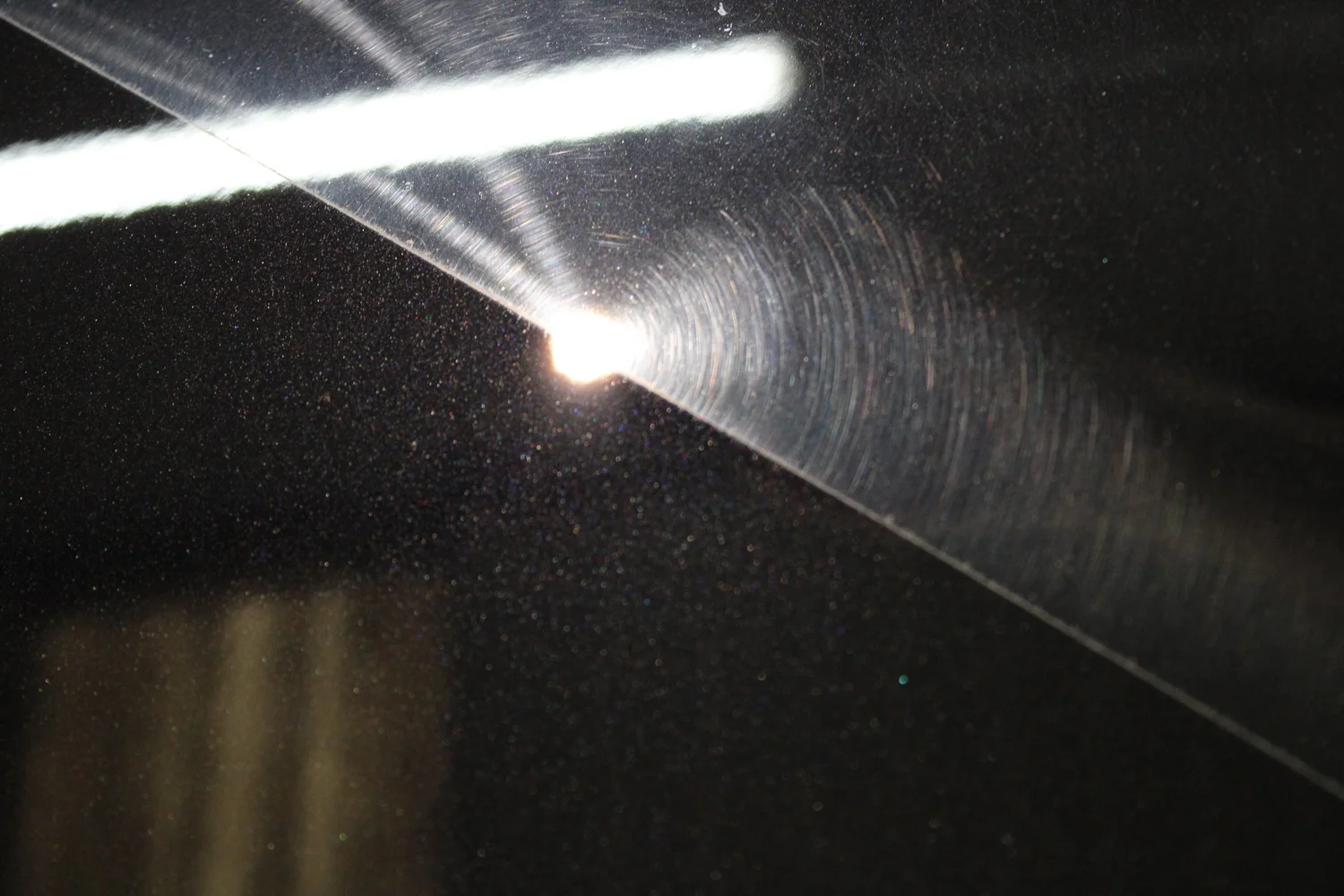 Swirl marks under inspection light — paint correction Swansea